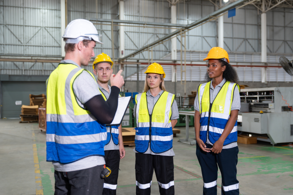supervisor guiding their team during white card training